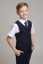 Boy in school uniform shirt vest
