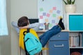 Boy Schoolboy Does Homework In sitting at a table at home. Back to school. Home study setting Royalty Free Stock Photo