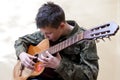 Boy scout guitar Royalty Free Stock Photo