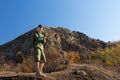 Boy scout or ranger out on a wilderness trail