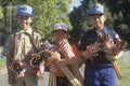 Boy Scouts distributing American flags Royalty Free Stock Photo