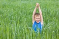 Boy screaming in the grass