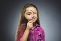 Boy See Through Magnifying Glass, Kid Eye Looking with Magnifier Lens over Gray Royalty Free Stock Photo