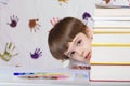 Boy of seven years old with books. Back to school