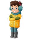 A boy shivering in winter weather Royalty Free Stock Photo