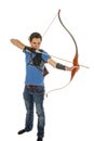 Boy shooting with bow and arrow