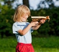 Boy shooting with crossbow Royalty Free Stock Photo