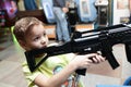 Boy shooting a rifle Royalty Free Stock Photo