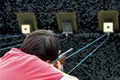 Boy Shooting a Rifle at a Country Show Shooting Gallery Royalty Free Stock Photo