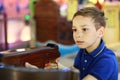 Boy shoots crossbow Royalty Free Stock Photo