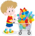 Boy with a shopping trolley of gifts