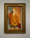 Boy in Short Pants, an oil on canvas by Amedeo Modigliani in 1918, on display in the Dallas Museum of Art.