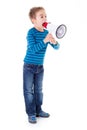Boy shouting into big white megaphone Royalty Free Stock Photo