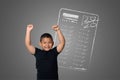 The boy showed full marks in some subjects tests on the blackboard Royalty Free Stock Photo