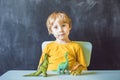 Boy showing a dinosaur as a paleontologist Royalty Free Stock Photo