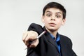 Boy shows his hand with a pen Royalty Free Stock Photo