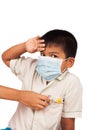 boy sick wear mask and themometer