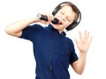 Boy singing into a microphone. Very emotional. Royalty Free Stock Photo