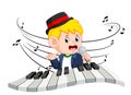 Boy singing and playing piano Royalty Free Stock Photo