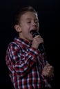 Boy singing Royalty Free Stock Photo