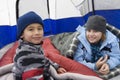 Boy And Sister Relaxing Inside Tent Royalty Free Stock Photo