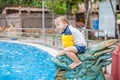 A boy sits on the Asian statue Royalty Free Stock Photo