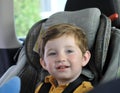 Boy sitting in child car seat Royalty Free Stock Photo
