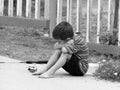 Boy Sitting Disappointed Royalty Free Stock Photo