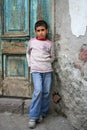 A boy sitting at the doorstep Royalty Free Stock Photo