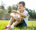 Boy sitting grass Royalty Free Stock Photo