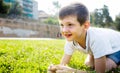 Boy sitting grass Royalty Free Stock Photo