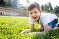 Boy sitting grass Royalty Free Stock Photo