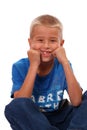 Boy Sitting and Smiling Royalty Free Stock Photo