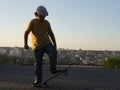 Boy Skateboarder doing jump trick in urban location Royalty Free Stock Photo