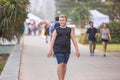 Boy skateboarding along the Main Beach esplanade at Surfers Paradise on the Gold Coast in Queensland, Australia Royalty Free Stock Photo