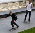 boy skateboarding on street training site