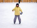 Boy skating on an outdoor ice rink Royalty Free Stock Photo