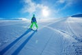 Boy ski downhill fast the fresh track on sunny morning Royalty Free Stock Photo