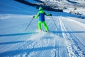 Boy ski downhill fast the fresh track view from behind Royalty Free Stock Photo