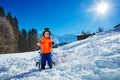 Boy at ski school three years old child in snow over mountains Royalty Free Stock Photo