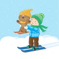 The boy skiing with a teddy bear