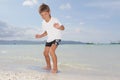 Boy with skim board on sea background Royalty Free Stock Photo