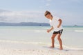 Boy with skim board on sea background Royalty Free Stock Photo