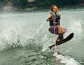 Boy Slalom Skier Jumping Wake Royalty Free Stock Photo