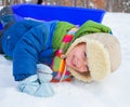 Boy on sleds in snow