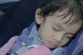 boy sleeping in child car seat Royalty Free Stock Photo