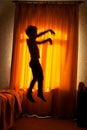 Boy sleepwalker jumping from bed