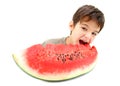 A boy and slice of watermelon Royalty Free Stock Photo
