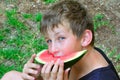 A boy with a slice of watermelon Royalty Free Stock Photo