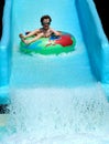 Boy on slide at waterpark